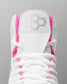 White wrestling shoe with pink accents on a gray background
