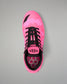 A single high-top Wrestling shoe in vibrant pink with a tonal pink and black chevron pattern, black laces, and a black and pink honeycomb-patterned lining, shown from a top-down view on a neutral gray background.