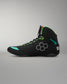 Black wrestling shoe with green accents on a gray background
