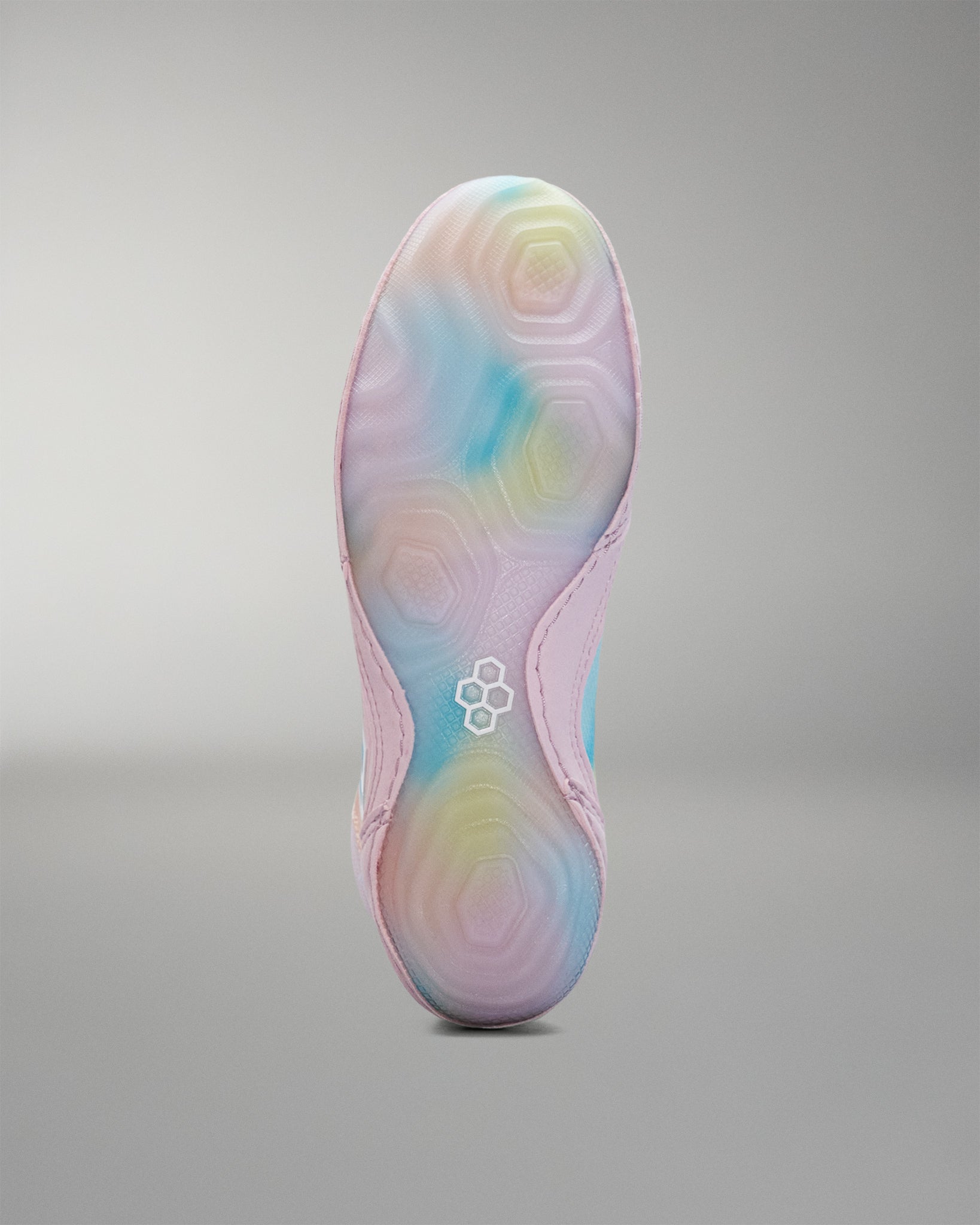 Colorful Wrestling shoe sole with a brand logo on a gray background