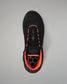 A black Wrestling shoe with vibrant orange accents, shown from a top-down view on a neutral gray background.