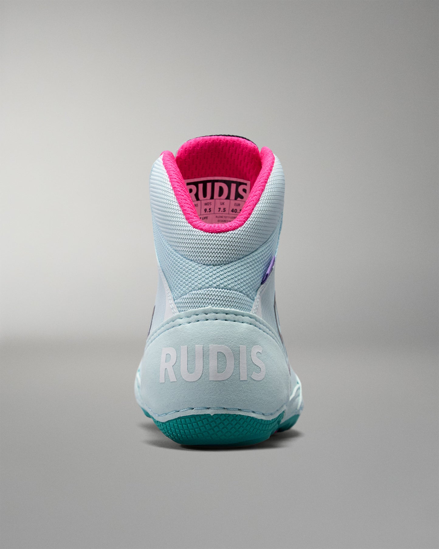 Light blue athletic shoe with pink lining on a gray background