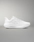 White athletic shoe on a gray background