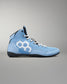 A light blue high-top wrestling shoe with white laces, a white geometric side logo, and a black sole, photographed against a neutral gray background.