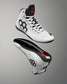 A pair of white high-top wrestling shoes with black and red accents, shown from the side and bottom angles against a gray gradient background.