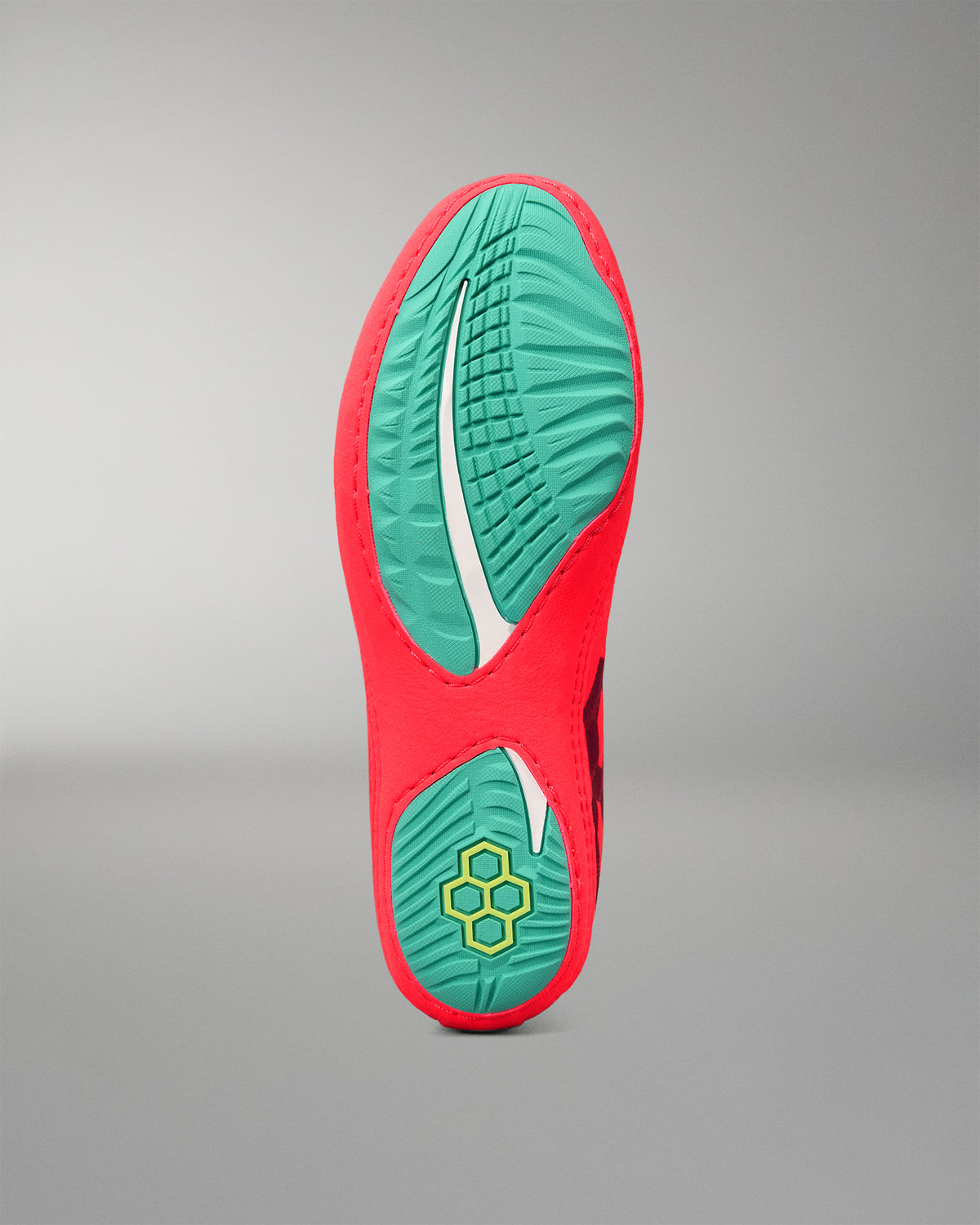Bottom view of the RUDIS Hildebrandt 2.0 Women’s Wrestling Shoe showing the teal split outsole and multidirectional traction pattern.