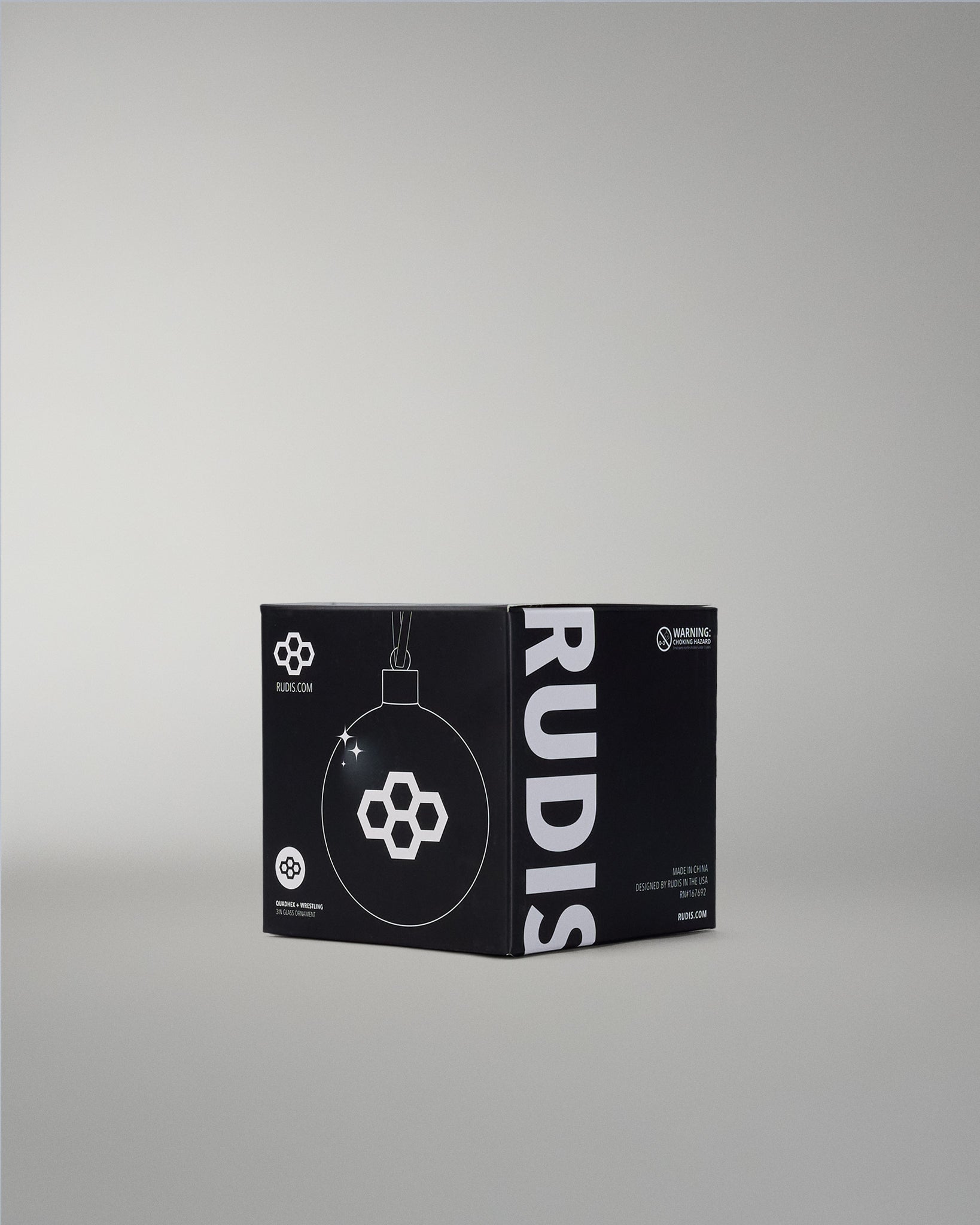 Black box with RUDIS branding on a gray background