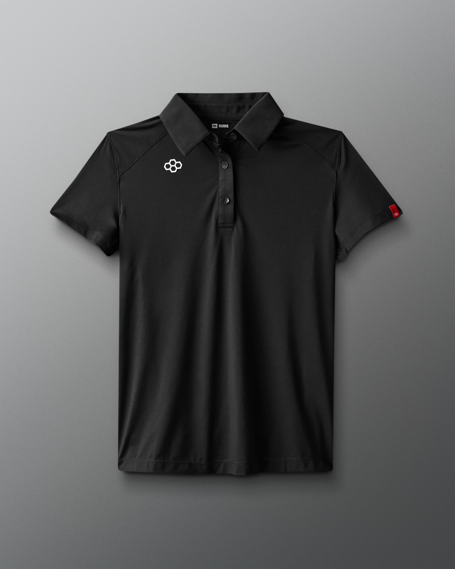 Black polo shirt with a logo on a gray background