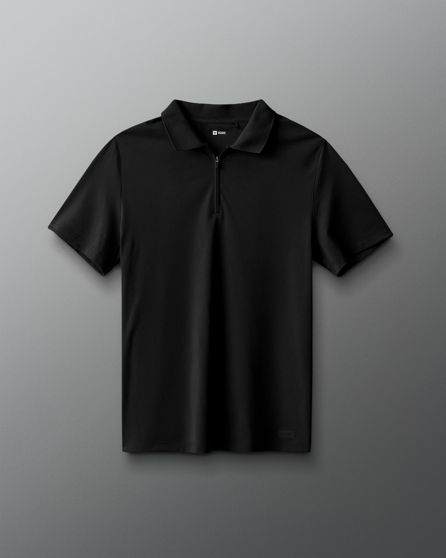 Black polo shirt with a logo on a gray background
