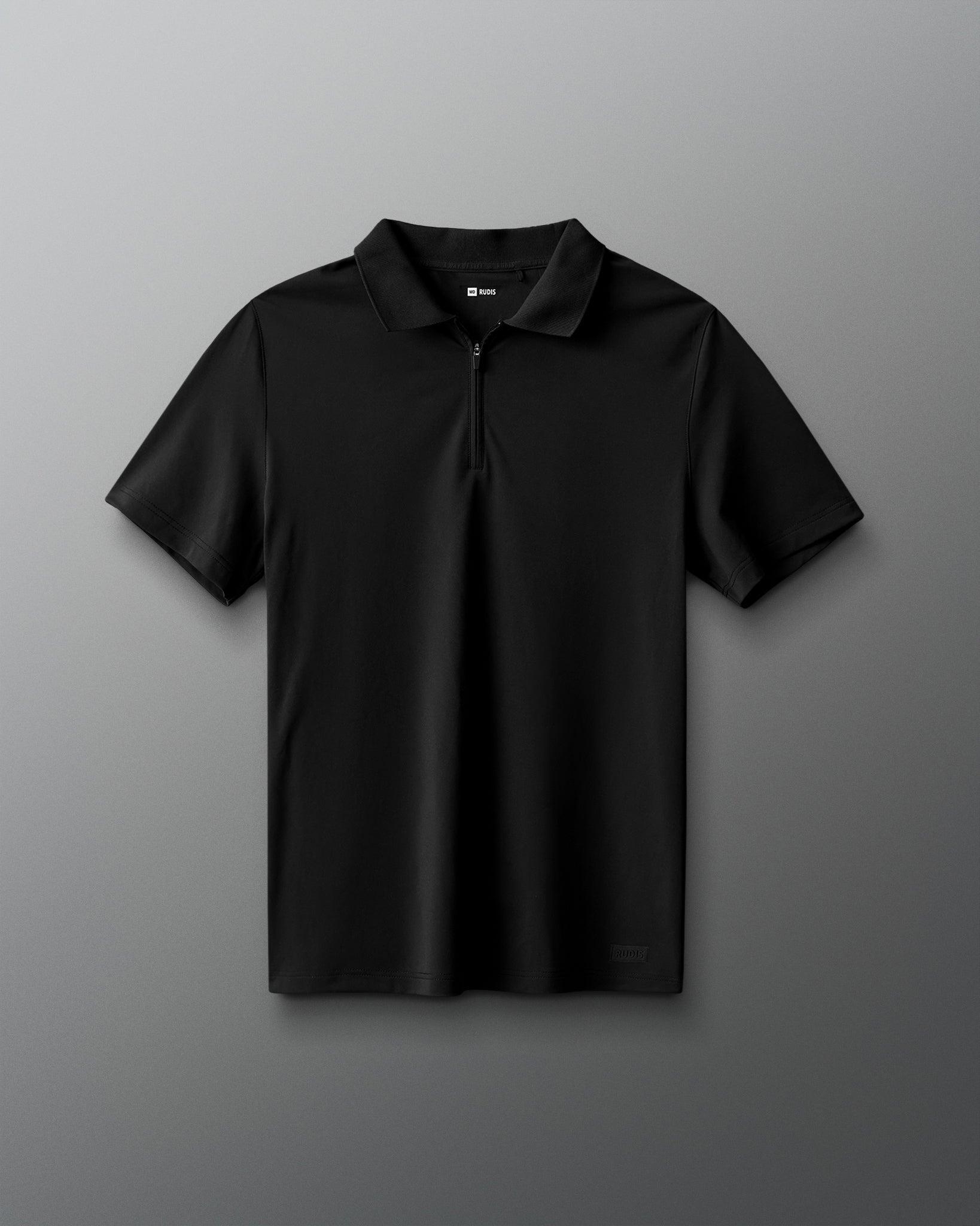 Black polo shirt with a logo on a gray background