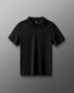 Black polo shirt with a logo on a gray background