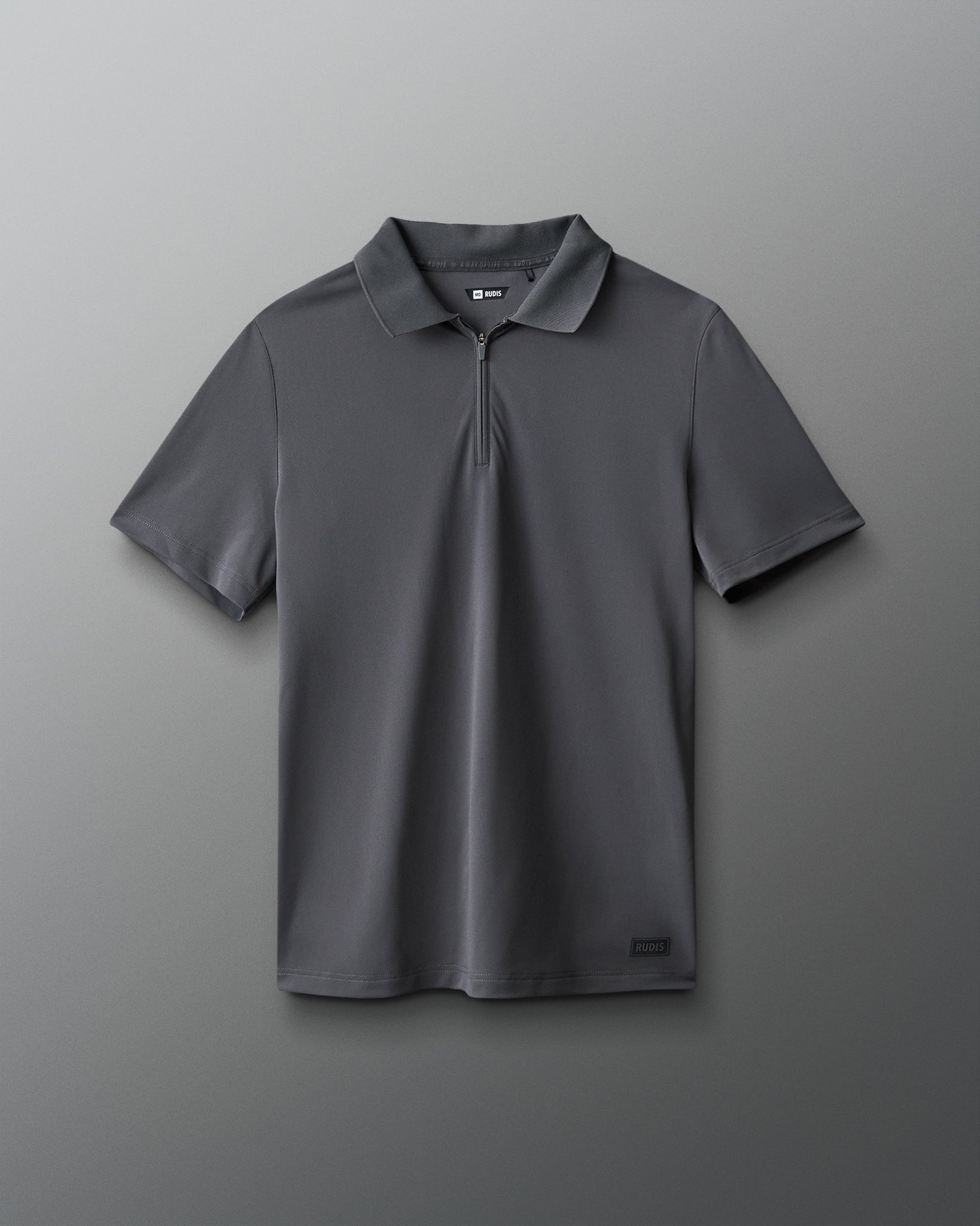 Gray polo shirt with a logo on a gray background
