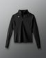 Black long-sleeve shirt with a logo on a gray background