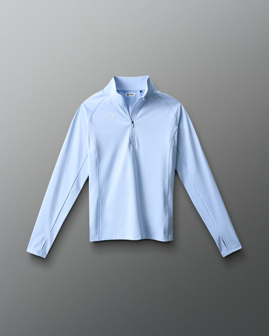 Light blue long-sleeve shirt on a gray background