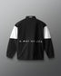Black jacket with white sleeves and 'A Way of Life' text on a gray background