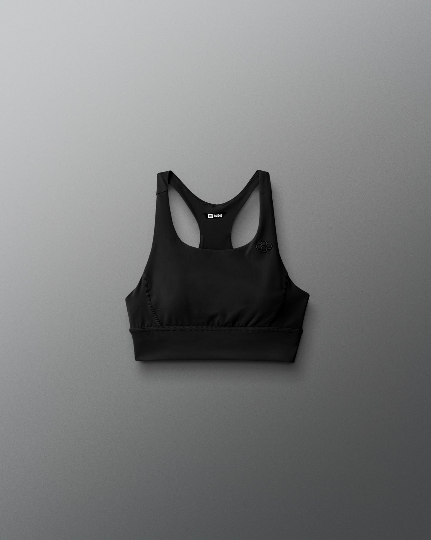 Black sports bra on a gray background