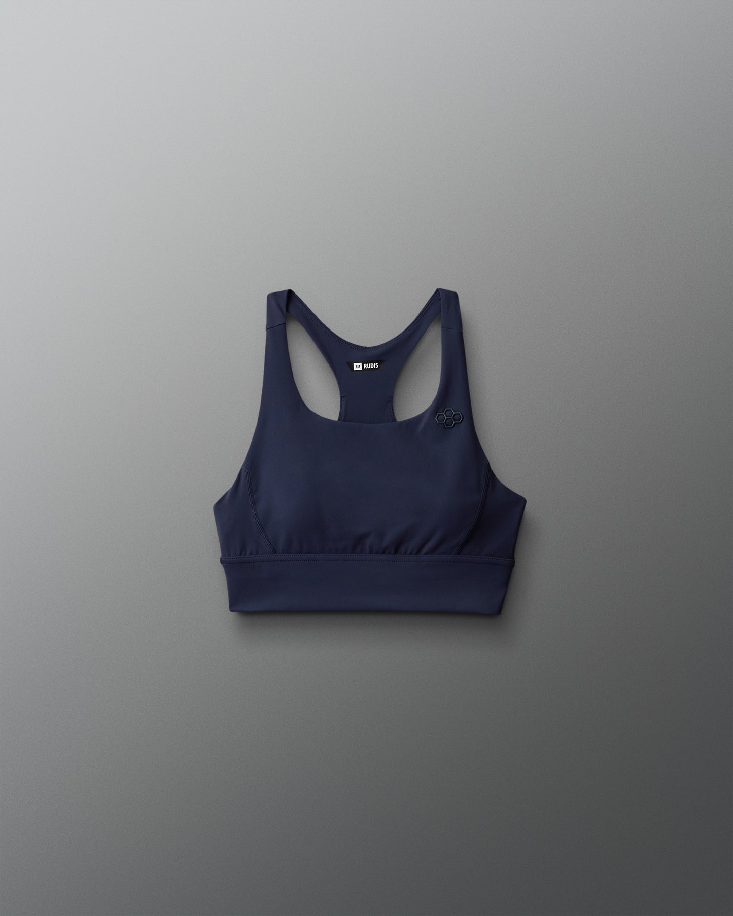 Navy blue sports bra on a gray background