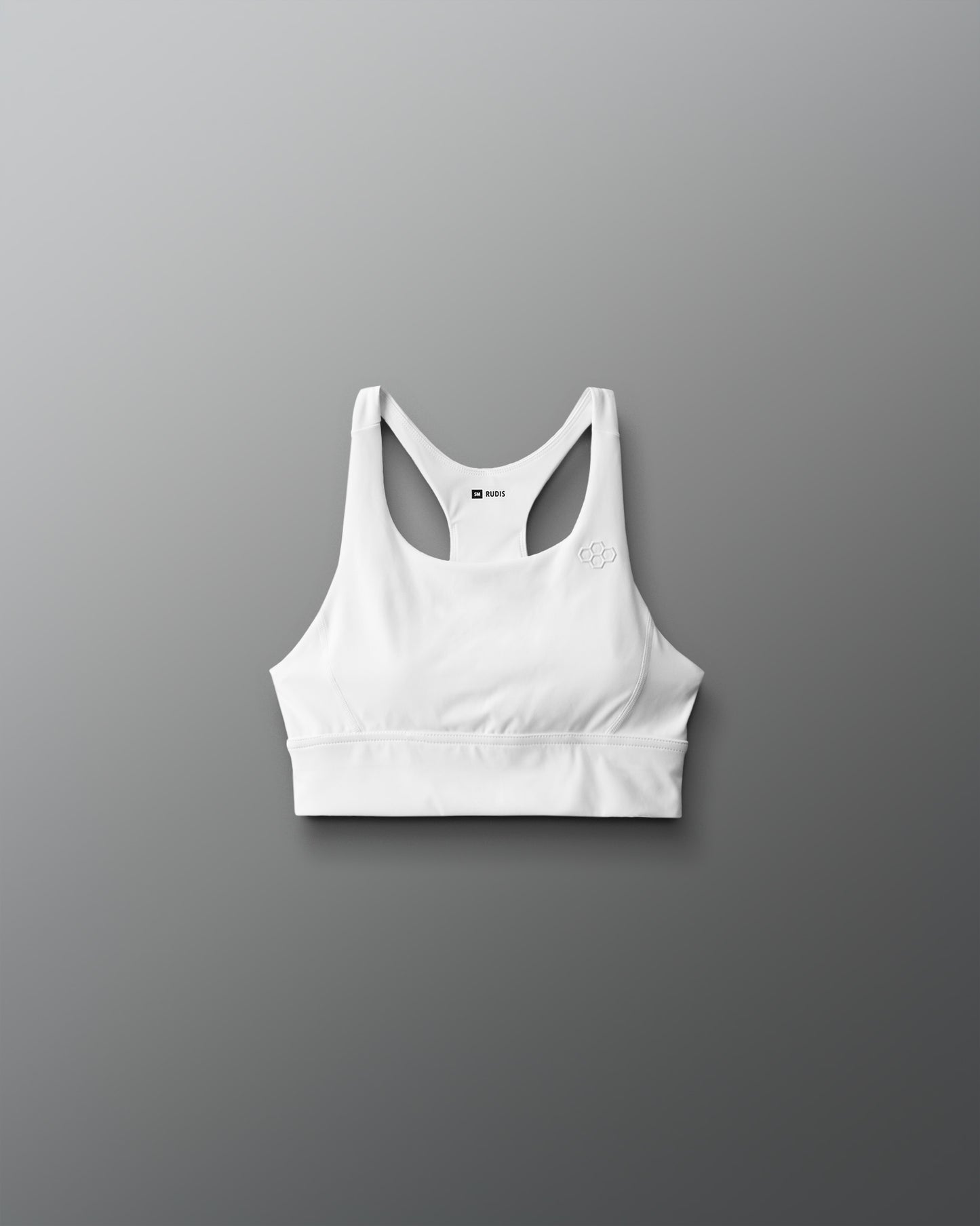 White sports bra on a gray background