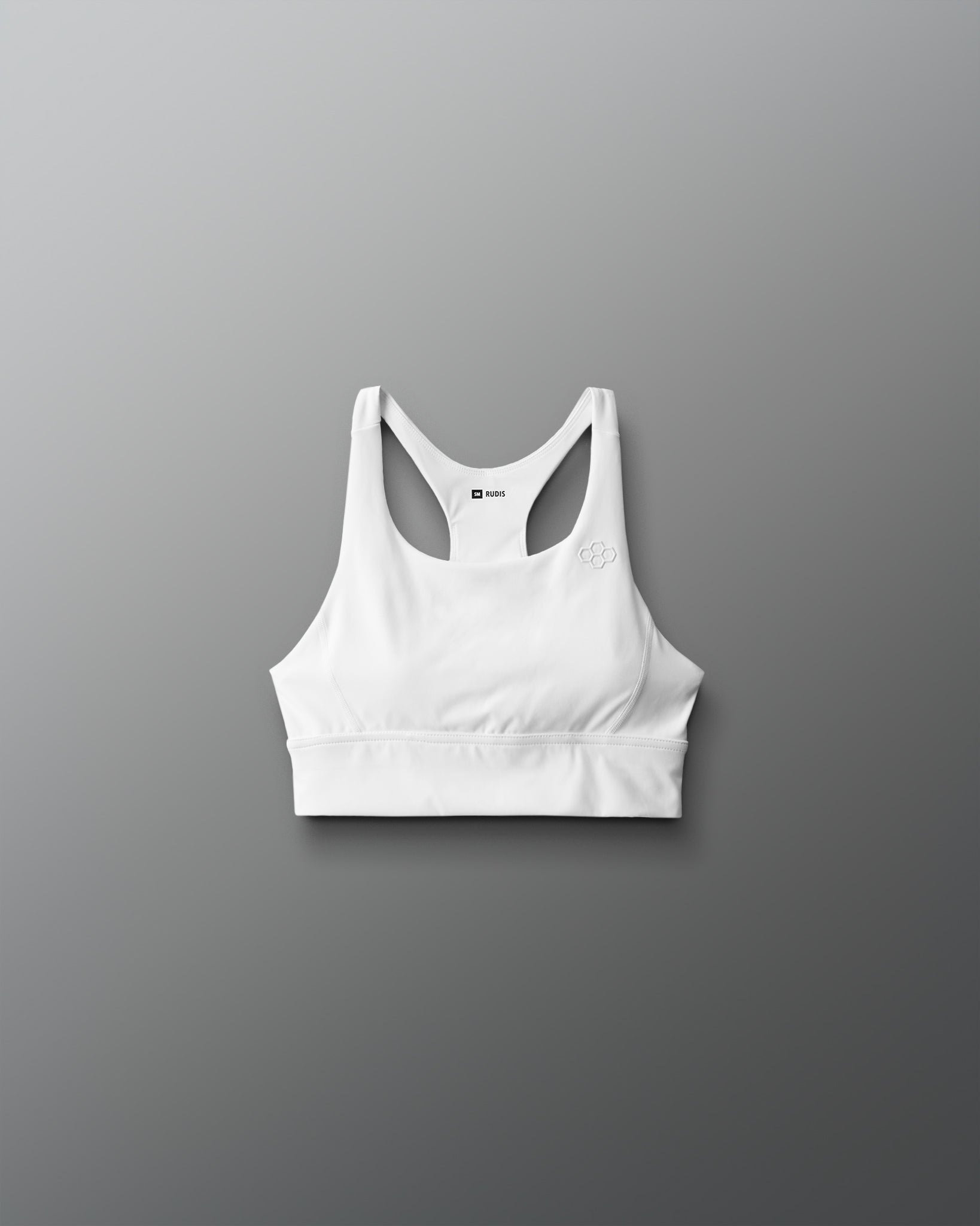 White sports bra on a gray background