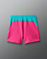 Pink shorts with teal waistband on a gray background