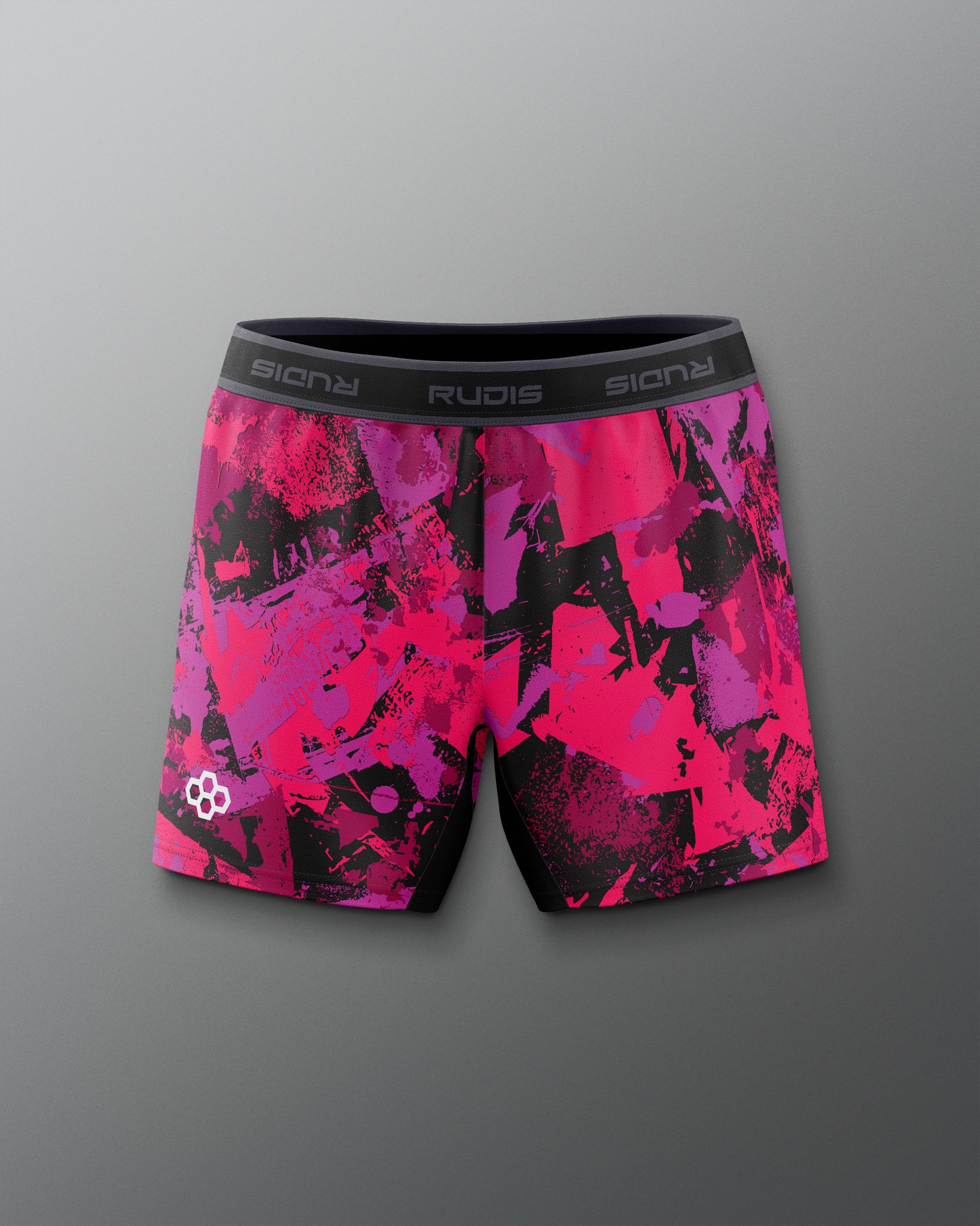 Pink and black patterned shorts with brand logo on a gray background