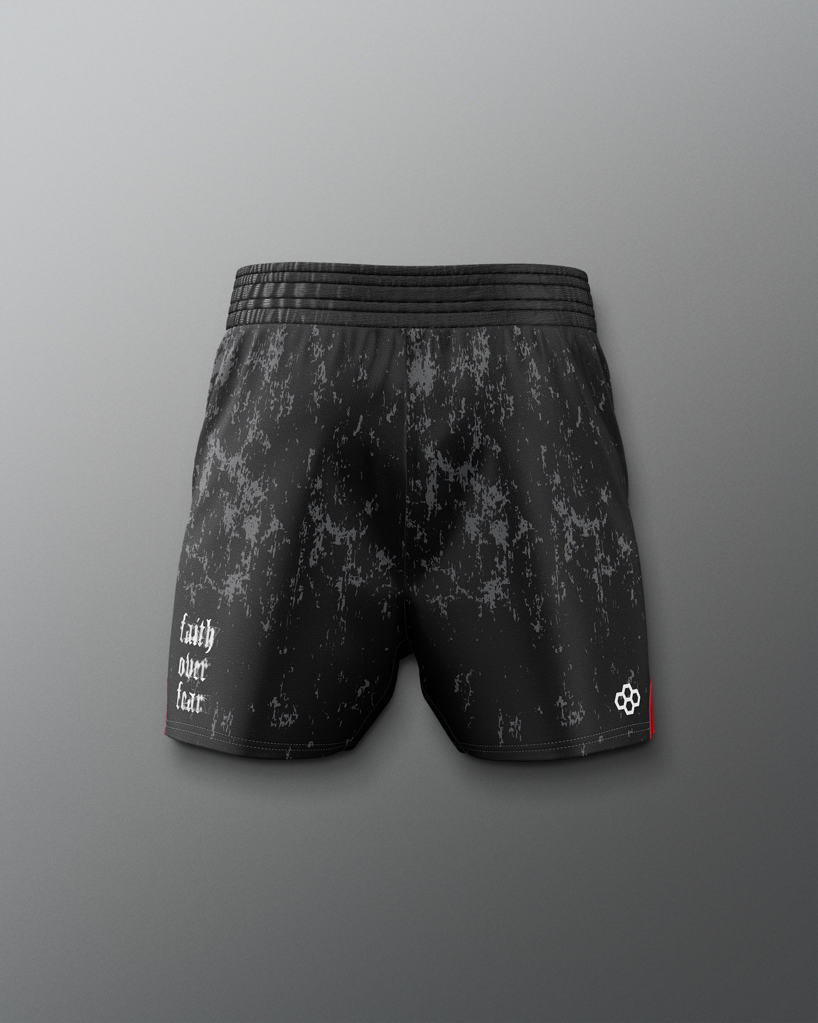Black patterned shorts on a gray background