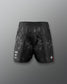Black patterned shorts on a gray background