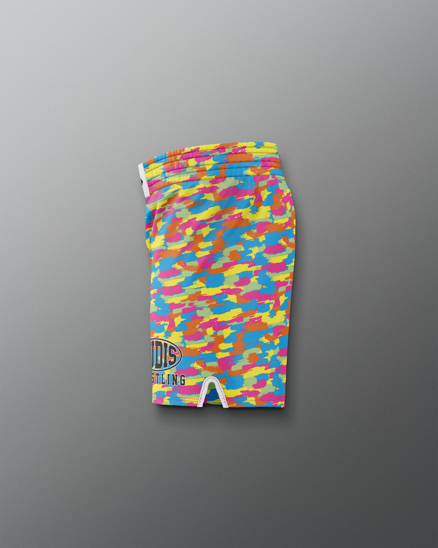 Colorful camouflage shorts on a gray background