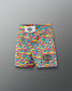 Colorful camouflage wrestling shorts with visible branding on a gray background