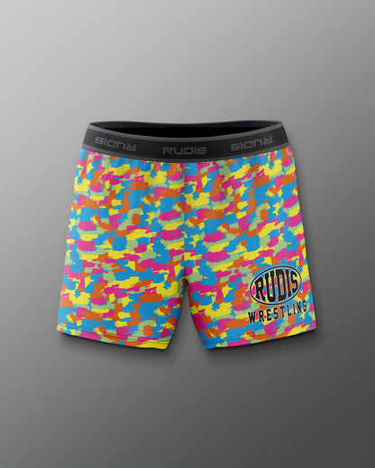 Colorful camouflage athletic shorts with 'Rudis Wrestling' logo on a gray background