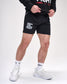 Person wearing black shorts with 'Fight the Good Fight' text, white sneakers, and socks on a white background.