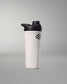 White shaker bottle with black lid on a gray background