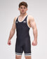 Man wearing a black wrestling singlet on a white background