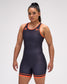 Black and Orange wrestling singlet on a gray background