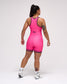 Person wearing a pink wrestling singlet on a white background