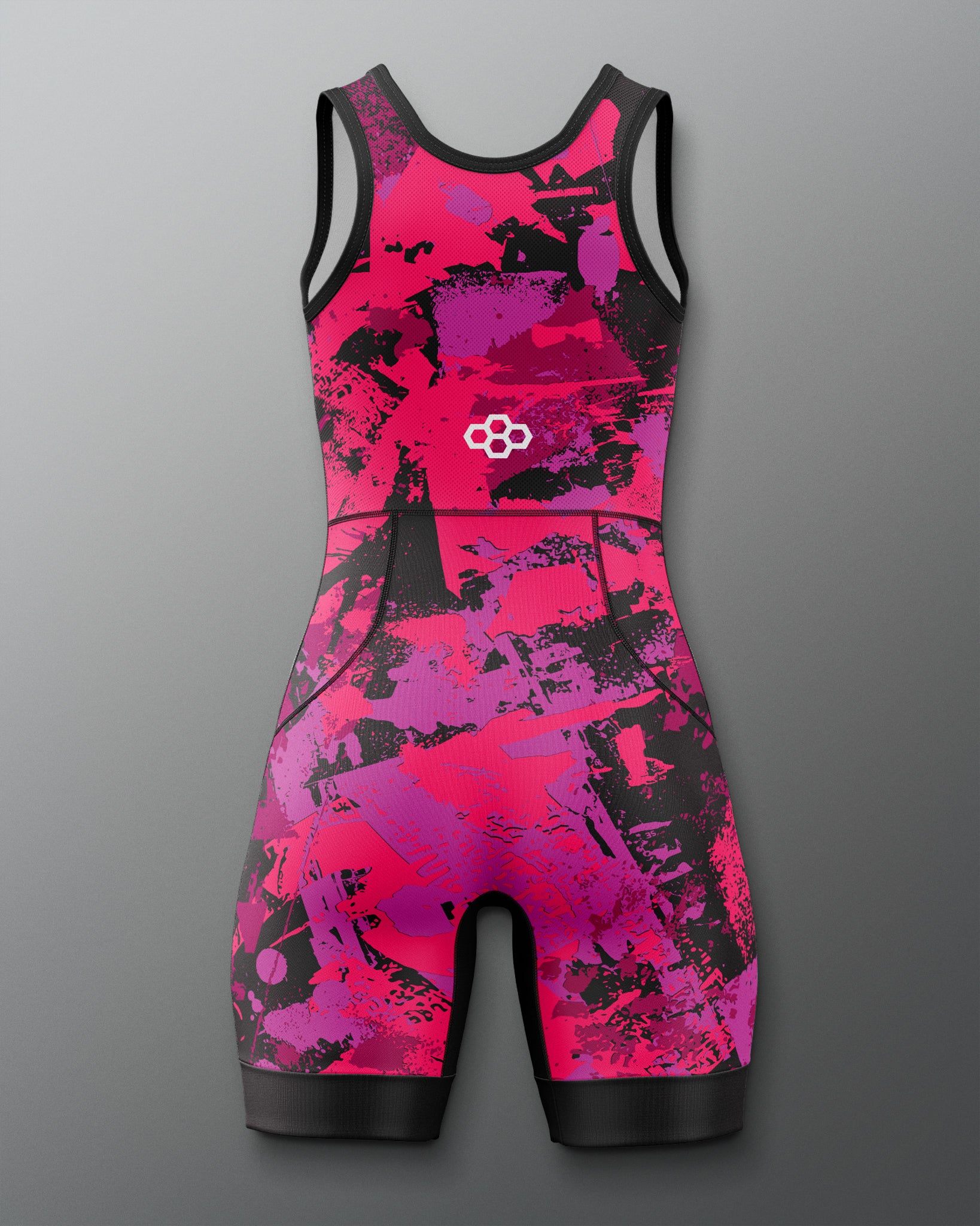 Pink and black patterned swimsuit on a gray background