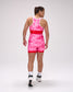 Person wearing a pink and red wrestling singlet on a white background