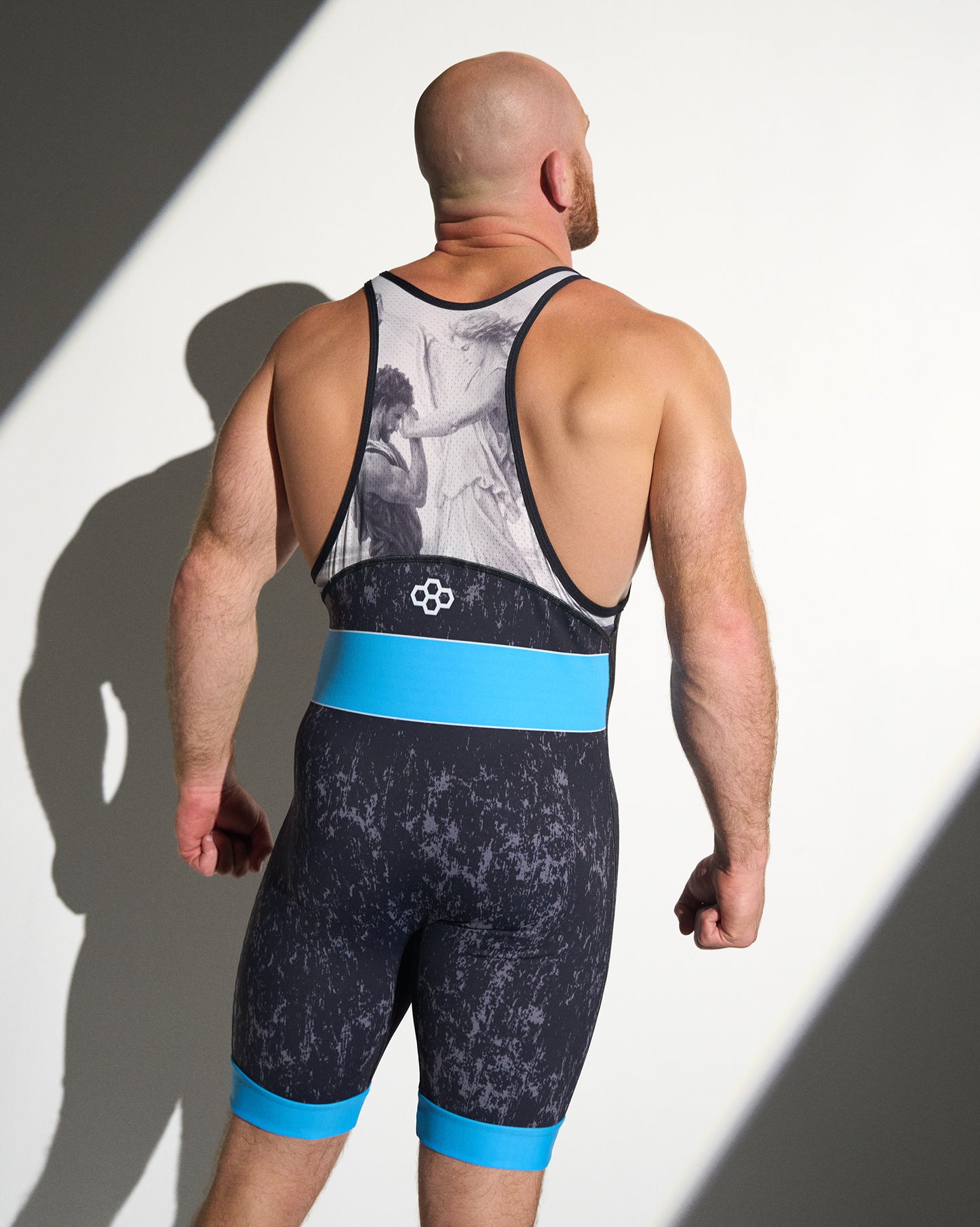 Back view of the RUDIS Faith Over Fear Freestyle Elite 2.0 Wrestling Singlet in blue featuring a breathable racerback design, artistic sublimated back panel, and elite competition fit.