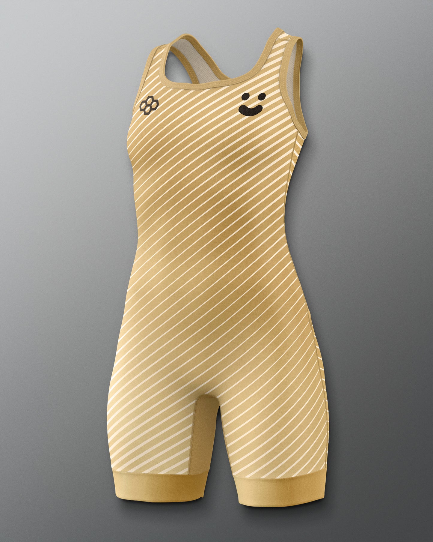 A sleeveless athletic wrestling singlet in warm beige and white diagonal stripes, shown on a gray gradient background. It features a small black Olympic rings logo on the left chest and a small smiley face graphic on the right chest.