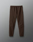 Brown sweatpants on a gray background