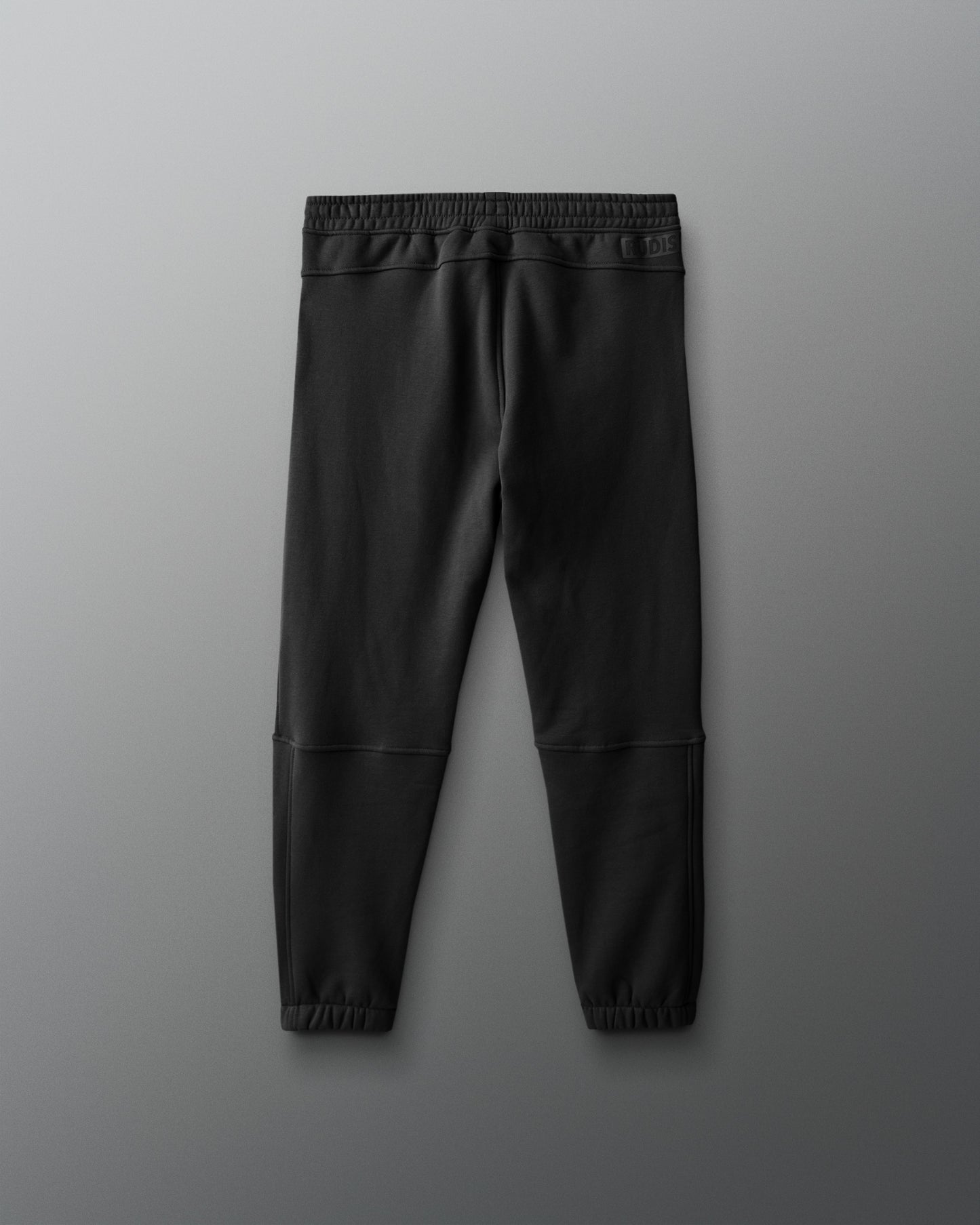 Black pants on a gray background