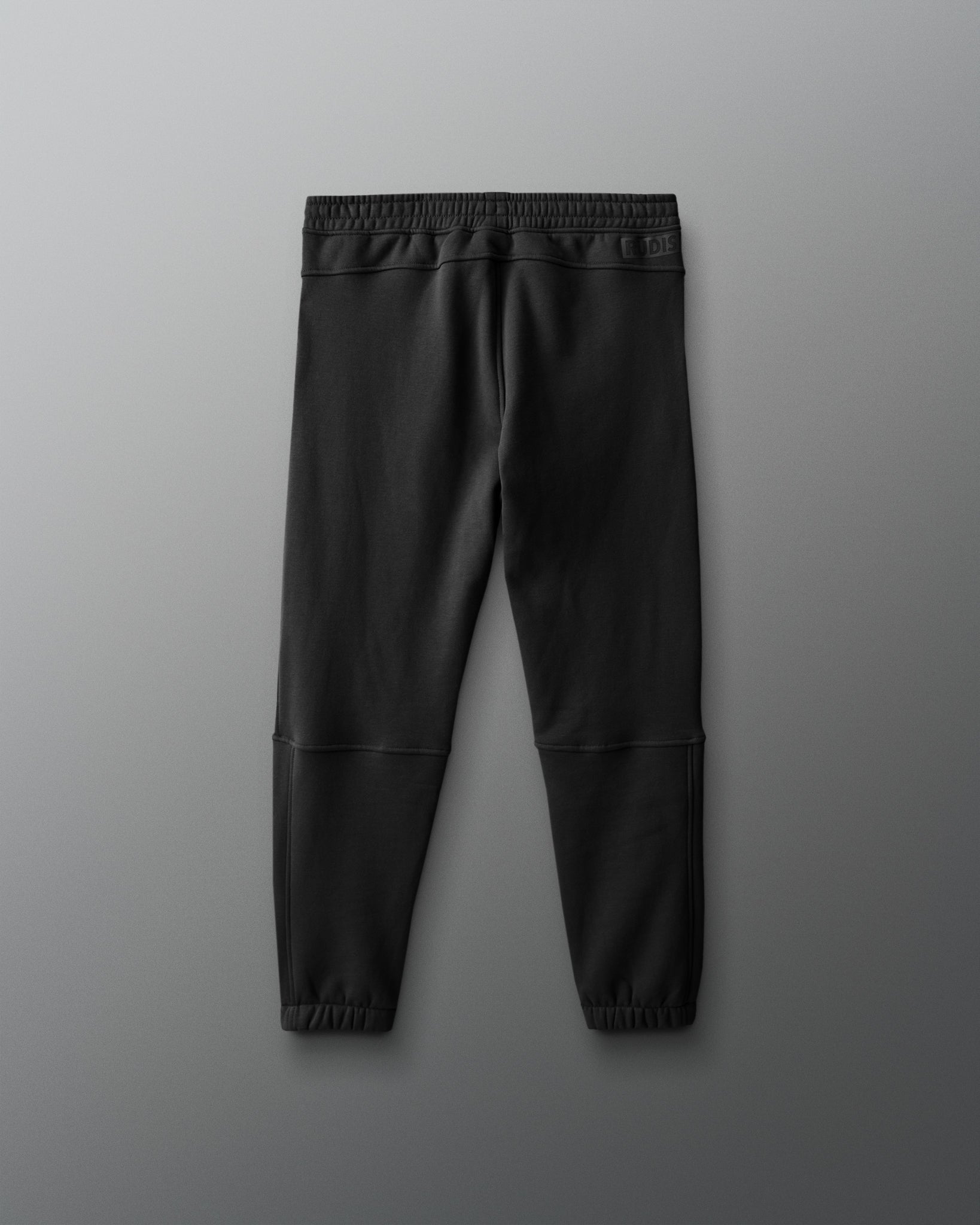 Black pants on a gray background