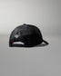 Black mesh cap with a logo on a gray background