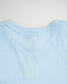 A light blue T-shirt featuring a simple modern design with a subtle white graphic at the neckline