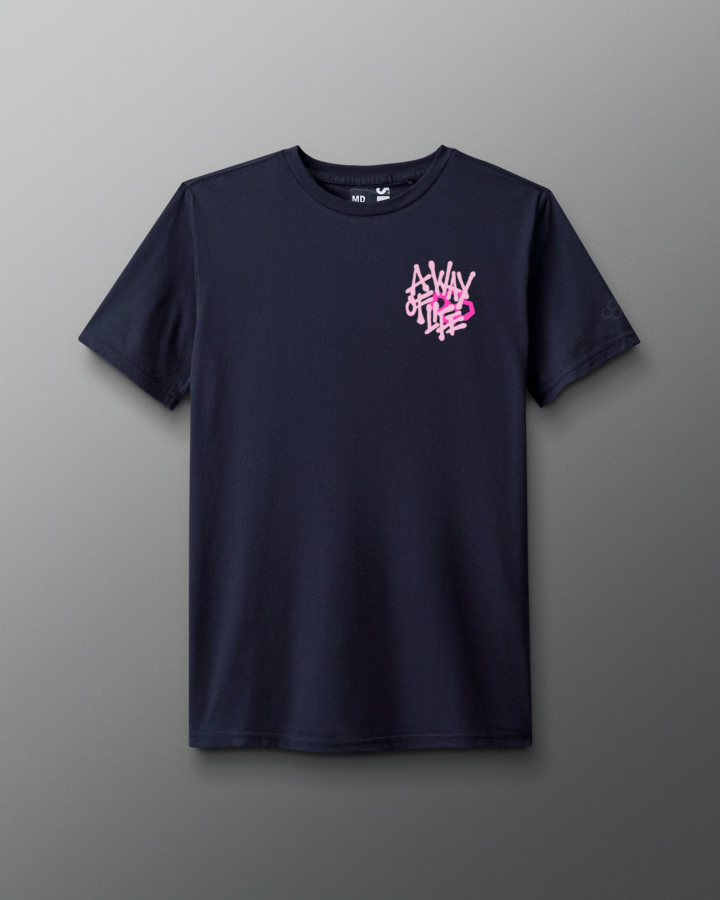 Front view of a navy T-shirt with a small white and pink graphic on the left chest that reads ‘A Way of Life’ in stylized overlapping text. 