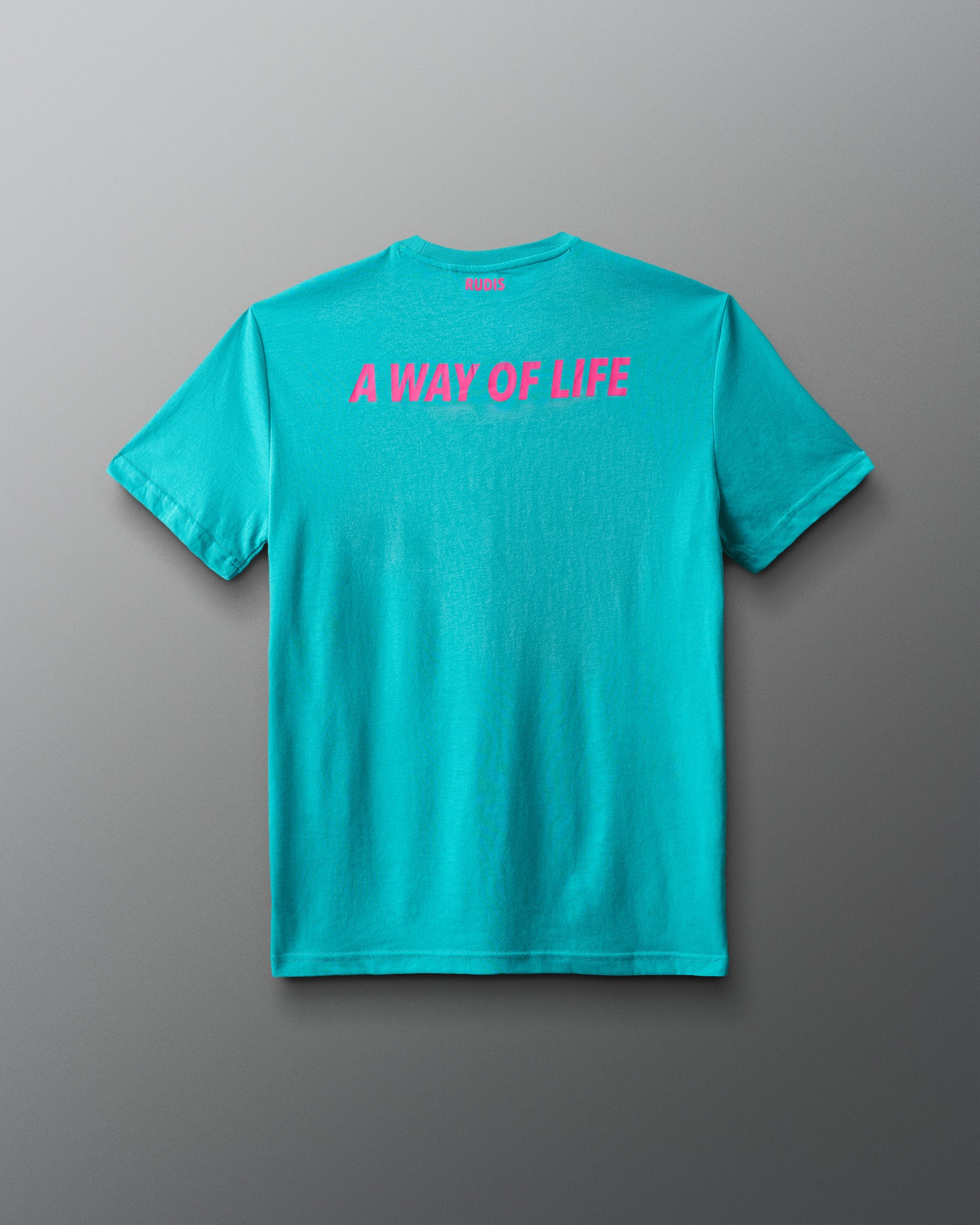 Turquoise t-shirt with pink text 'A WAY OF LIFE' on a gray background