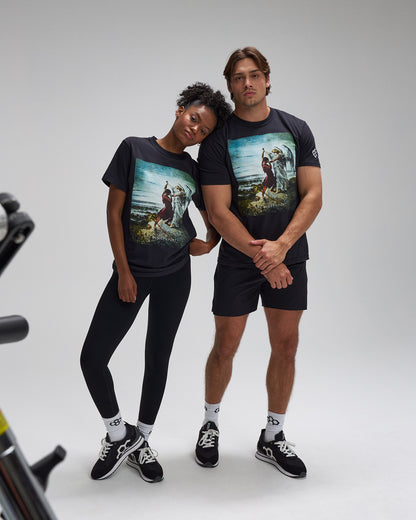 Two people wearing matching graphic t-shirts on a plain background. Faith Over Fear Divine Struggle Wrestling shirt graphics
