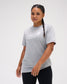 Female athlete wearing the gray RUDIS Motto Scripted Elite Super Soft T-Shirt featuring a white All In chest graphic.