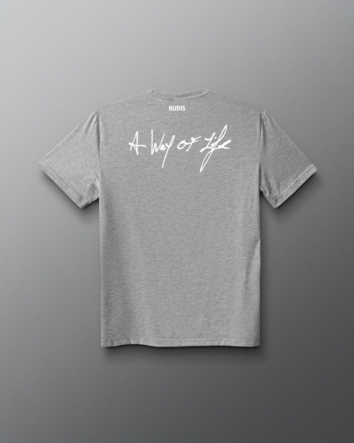 A heather gray short-sleeve t-shirt shown from the back, featuring a white cursive graphic that reads 'A Way of Life' across the upper back and a small 'RUDIS' brand logo printed inside the neck collar.