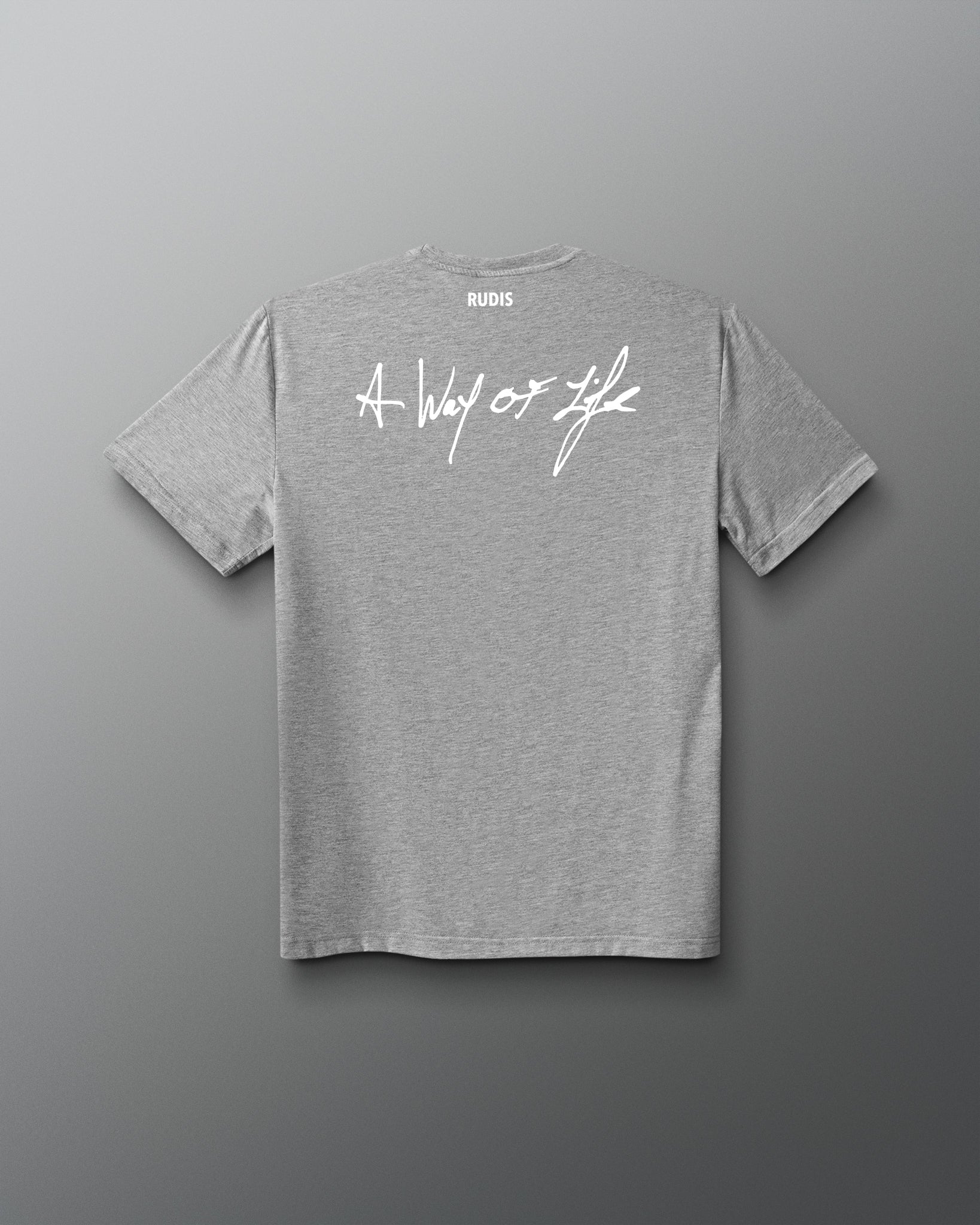 A heather gray short-sleeve t-shirt shown from the back, featuring a white cursive graphic that reads 'A Way of Life' across the upper back and a small 'RUDIS' brand logo printed inside the neck collar.